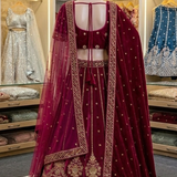 Rosewood bridal lehenga back view showing blouse design and dupatta drape