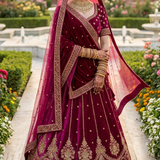 Rosewood maroon bridal lehenga with gold zari embroidery, front view