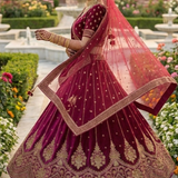 Rosewood bridal lehenga skirt with gold embroidered border, back view mid-twirl