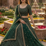 Emerald green embroidered lehenga close portrait, garden setting