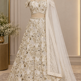 Ivory gold sequin embroidered bridal lehenga, front view on display