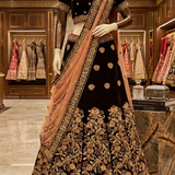 Midnight Maroon Embroidered Bridal Lehenga displayed on mannequin front