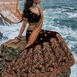 Midnight Maroon Bridal Lehenga featuring peach net dupatta