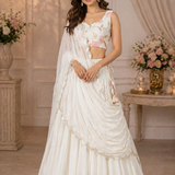 White floral lehenga with dupatta draped over shoulder, engagement wear