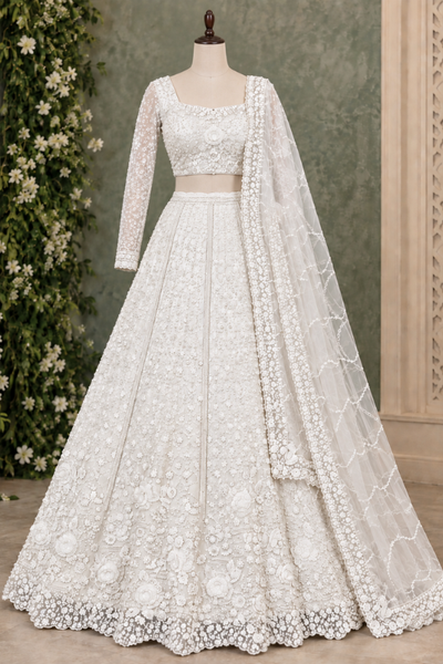Pearl white floral embroidered bridal lehenga, front view on display