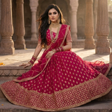 Bride seated wearing Rani Elegance Festive Lehenga Set