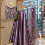 Amethyst lehenga front view on display showing satin skirt and dupatta