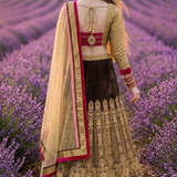 Mocha lehenga back view showing gold embroidered blouse and dupatta