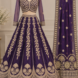 Royal purple zari embroidered bridal lehenga, front view on display
