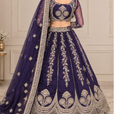 Royal purple bridal lehenga with golden embroidery, close portrait back view