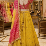 Sunset Yellow Ombre Lehenga displayed on mannequin back