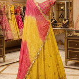 Sunset Yellow Ombre Lehenga displayed on mannequin front