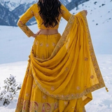 Sunshine Royale mustard lehenga back view showing dupatta drape over shoulders