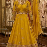 Sunshine Royale mustard embroidered lehenga set, front view on display