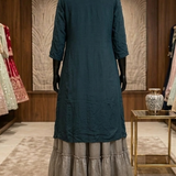 Teal kurta skirt set back view on display showing layered skirt