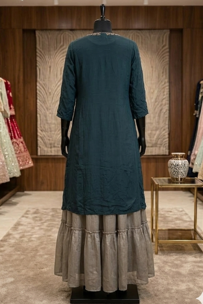 Teal kurta skirt set back view on display showing layered skirt