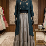 Teal embroidered kurta with grey flared skirt, front view on display