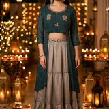Teal Indo-Western kurta skirt set with festive lantern backdrop