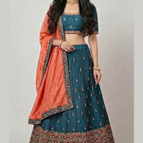 Teal blue lehenga with rust orange dupatta, front view