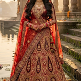 Bride in vintage zari bridal lehenga with gold embroidery, standing by temple steps