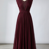 Wine maroon embellished evening gown, front view on display