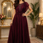 Woman in wine maroon evening gown with embellished bodice, front view